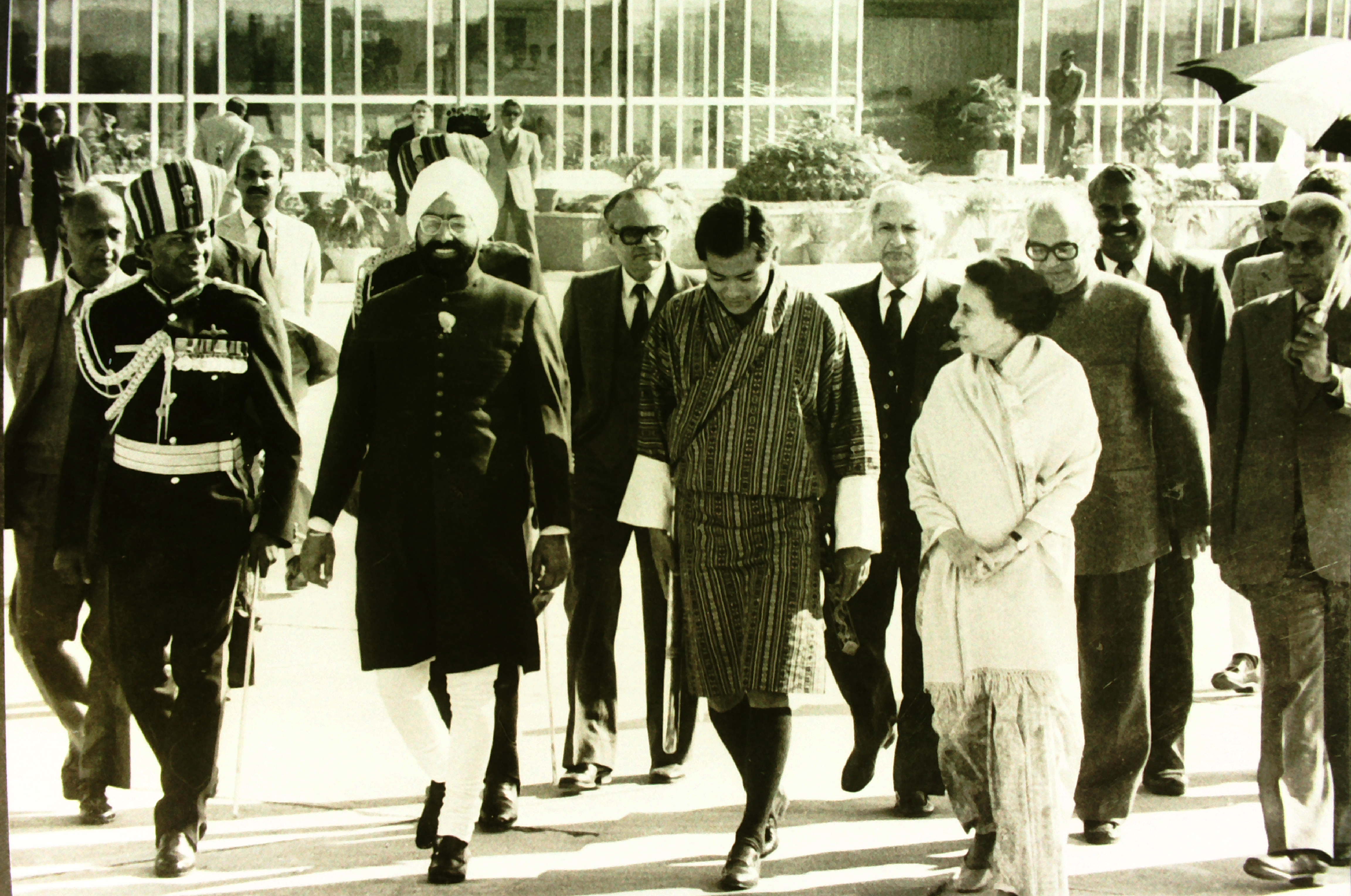 His Majesty Jigme Singye Wangchuck, The Fourth King of Bhutan, being received by Shri Giani Zail Singh, President of India, and Smt. Indira Gandhi, Prime Minister of India, during his State Visit to India, as the Chief Guest at the Republic Day Celebrations.
(January 1984)
