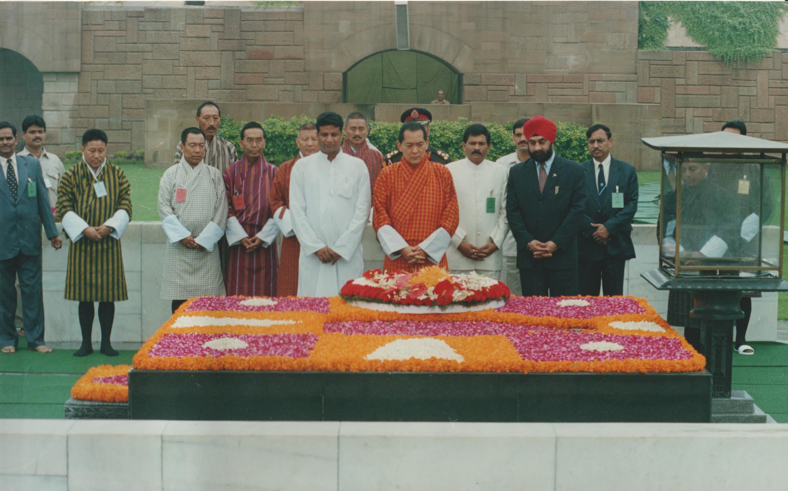 His Majesty Jigme Singye Wangchuck, The Fourth King of Bhutan laying a wreath at Raj Ghat, New Delhi.
(2003) 
