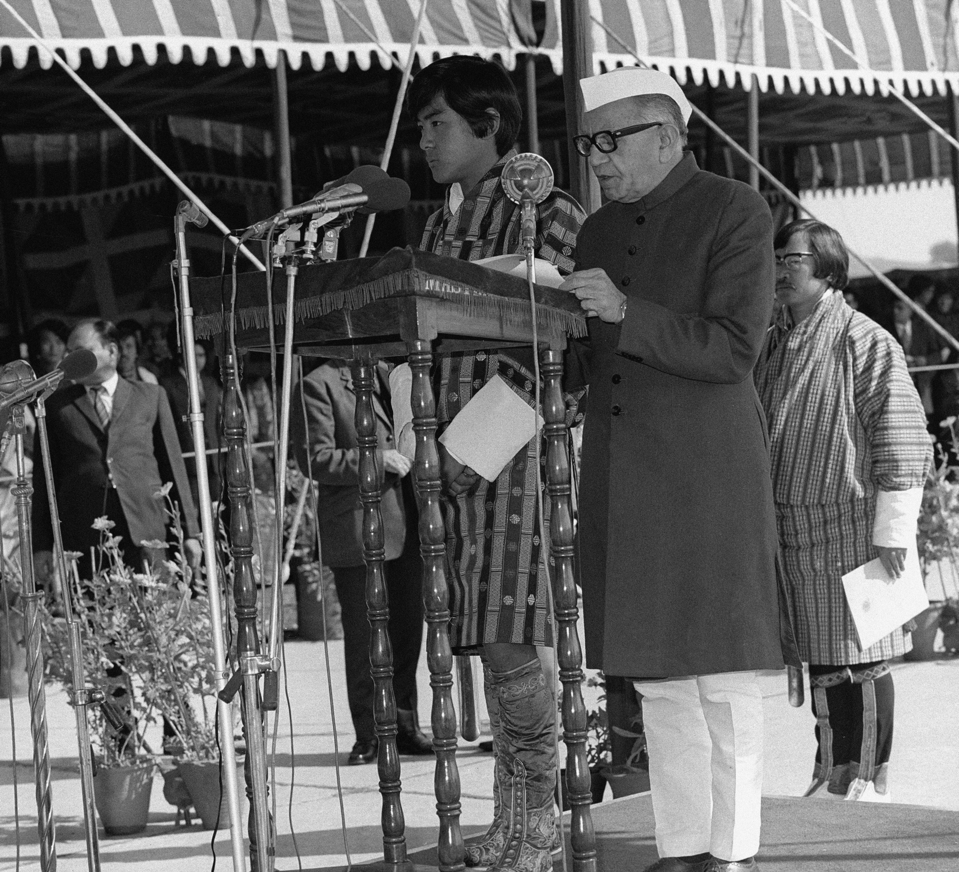 His Majesty Jigme Singye Wangchuk, The Fourth King of Bhutan being received by Shri Fakhruddin Ali Ahmed, President of India, on his arrival at Delhi airport. 
(18 December 1974)
