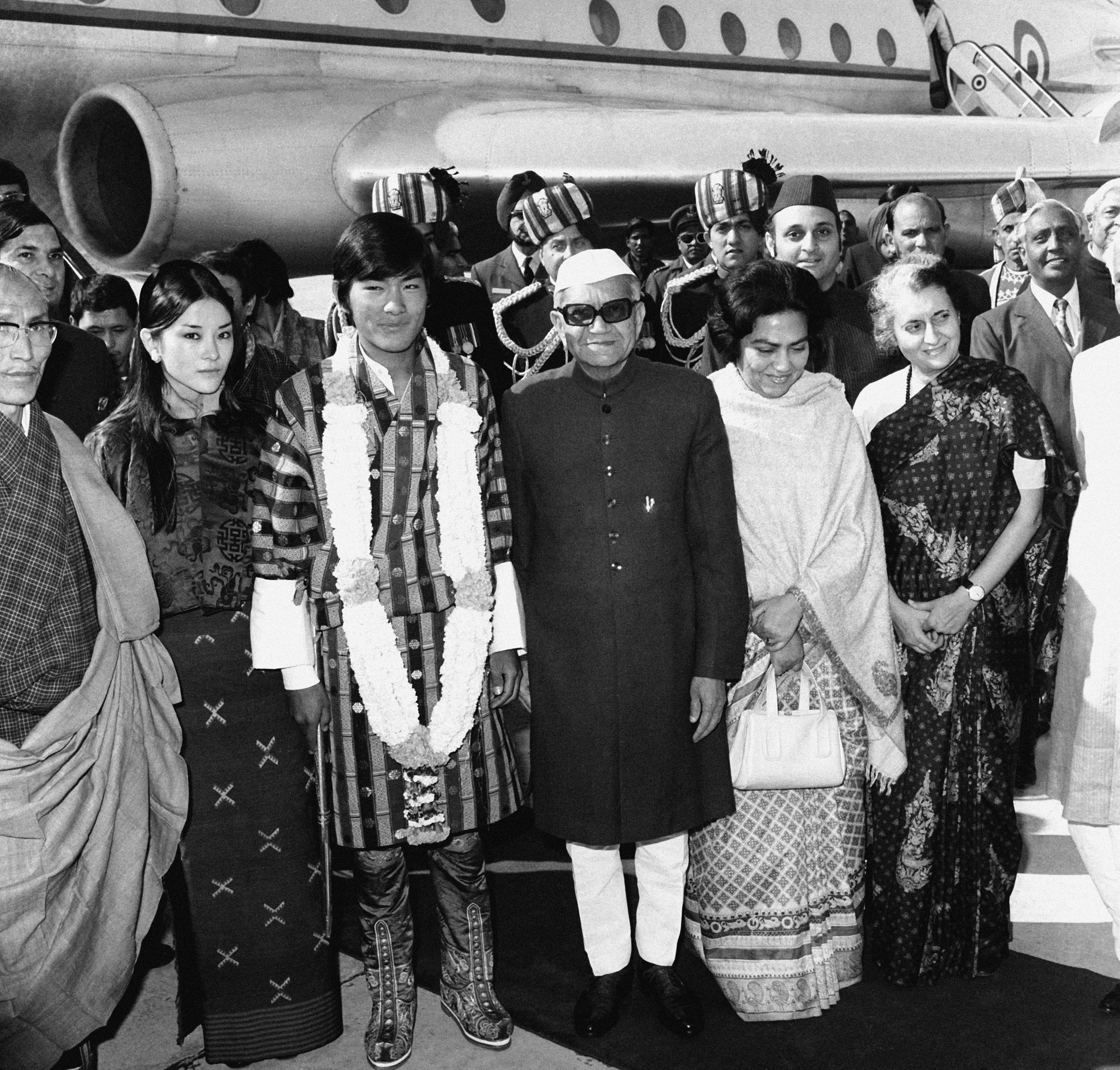 His Majesty Jigme Singye Wangchuk, The Fourth King of Bhutan being received by Shri Fakhruddin Ali Ahmed, President of India, on his arrival at Delhi airport. 
(18 December 1974)
